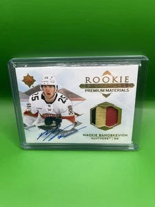 2023-24 UD Ultimate Mackie Samoskevich Rookie Signature Premium Patch Auto 04/65 - Picture 1 of 2