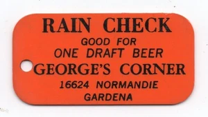Alte Zelluloid Regen Karo Medaille gut für ein Fassbier George's Corner Gardena - Bild 1 von 2