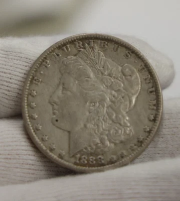 Dólar de plata Morgan de Estados Unidos 1888 $1 XF (limpio, retonizado) Foto 1 de 2