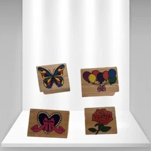 Set 4 timbri in gomma con manico in legno design assortito vintage. - Foto 1 di 2