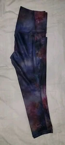 Capris Athleta Salutation II Supernova talla S con bolsillos escondidos - Imagen 1 de 5