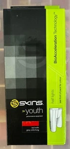 SKINS YOUTH HALF TIGHTS - RED - SIZE YM - FREE P&P! - Picture 1 of 4