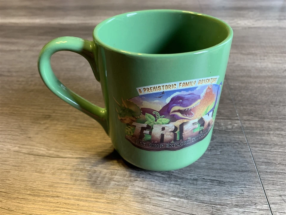 Taza de café T-Rex Restaurant A Prehistoric Family Adventure verde dinosaurio  Foto 1 de 4