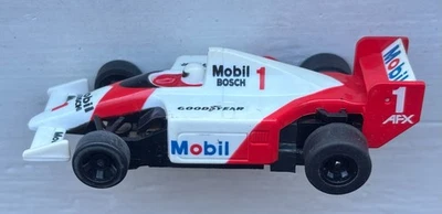 AFX TOMY SUPER-G+ 1991 McLaren HONDA MP4/6 #1 MOBIL BOSCH AyrtonSenna HO SlotCar - image 1 of 4