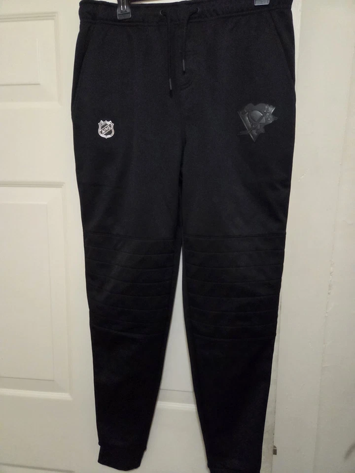 Calça de Moletom Masculina Pittsburgh Penguins NHL Autêntica Pro Fanatics Preta Tamanho M - Imagem 1 de 4