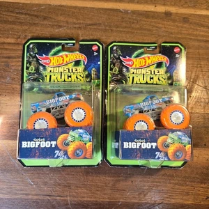 2X Mattel Hot Wheels Monster Trucks 4x4x4 BIGFOOT 1:64 2023 Glow in the Dark NEW - Picture 1 of 6