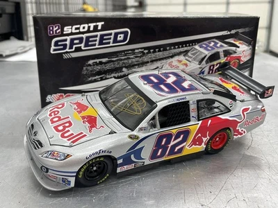 Scott Speed #82 Red Bull Autographed 2009 Toyota Camry 1/24 NASCAR Die-Cast - Image 1 of 4