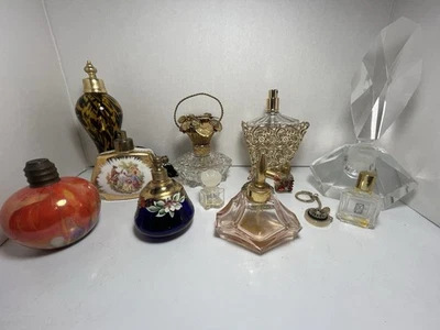 13 botellas y contenedores de perfume vintage Foto 1 de 4