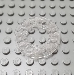 LEGO Translucent Clear 4x4 Round Plate Piece with 2x2 Center Hole - Picture 1 of 1