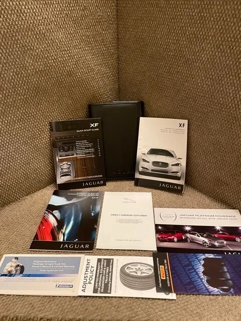 2012 Jaguar XF Owners Manual set with Navigation section, supplements and case Foto 1 de 1