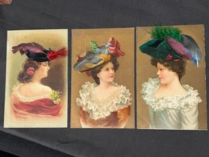 VIVID COLORFUL ,SET OF THREE,PRETTY WOMEN LITHOGRAPH PC'S W/ REAL FEATHER HATS!! - Picture 1 of 18