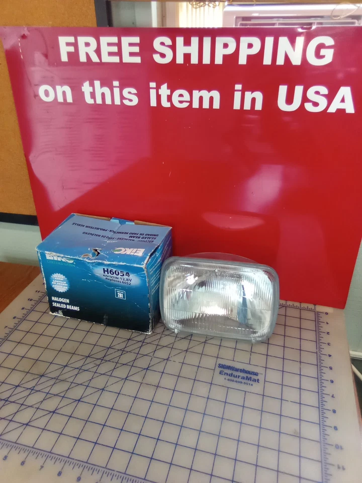 Faro halógeno sellado verde H6054 certificado EIKO, nuevo stock antiguo, gratis... Foto 1 de 4