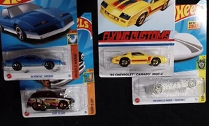4 Hot Wheels gelb Iroc-Z, blau Firebird, lila Malibu, Brailleschrift (4 Stück) Neu in Verpackung - Bild 1 von 5