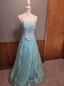 Formal, Prom, Quinceanera, or Bridesmaid dress size Medium in light blue color. - Picture 1 of 4