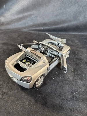 Литой открытый спидстер 1:18 от Maisto серебристый. ПОЖАЛУЙСТА, ПРОЧТИТЕ - Изображение 1 из 4