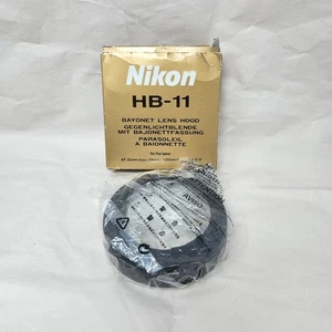 Nikon paraluce originale HB-11 per obiettivo 24mm-120mm F/3.5-5.6 mai usato in scatola - Foto 1 di 10