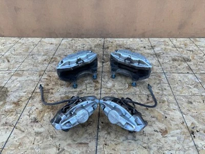 INFINITI NISSAN 2007-2024 OEM FRONT REAR LEFT RIGHT AKEBONO BRAKES CALIPERS ASSY - Image 1 of 4