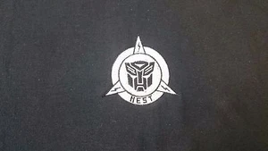 TRANSFORMERS NEST POLOSHIRT - Bild 1 von 1