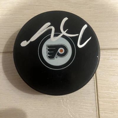 Disco automático firmado con logotipo de Sean Couturier Philadelphia Flyers Foto 1 de 2