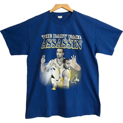 Camisa Steph Curry Baby Face Assassin Alstyle Azul Golden State Warriors NBA L Foto 1 de 4