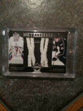 2011/12 Panini Limited Net Presence card of Patrick Kane and Henrik Lundquist.