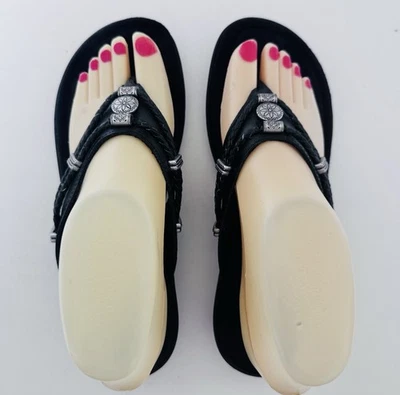 Sandalias chanclas Minnetonka negras Silverthorne trenzadas para mujer talla 7 EE. UU. Foto 1 de 4