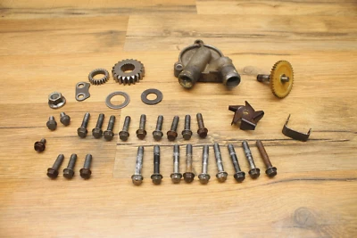 1995 95 Kawasaki KX60 KX 60 pernos de motor varios herrajes impulsor bomba de agua cubierta Foto 1 de 4