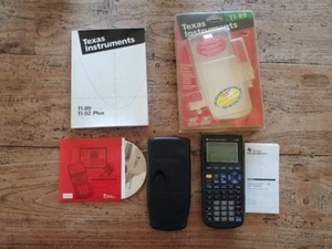 Texas Instrument TI-89 boxed + manual + cd - Photo 1/3