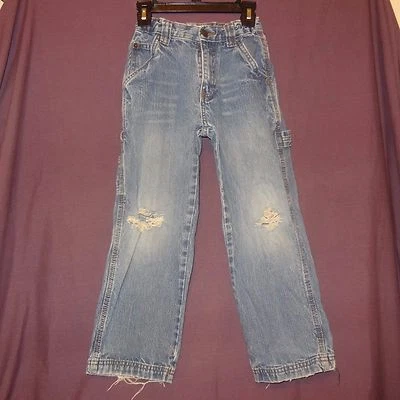 Jeans Denim Azul Carpintero Calce Niños Talla 7 Cherokee Rodillas Rasgadas Jugar  Foto 1 de 4