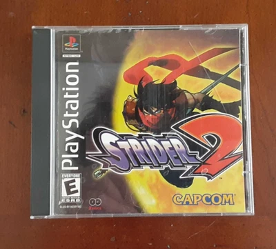 Strider 2 (PlayStation 1, PS1 2000) AMBOS DISCOS + Manual + Tarjeta Reg, Sin estuche Foto 1 de 4