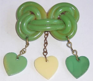 Vintage celluloid love knot and heart brooch Green and cream, hearts hang freely - Picture 1 of 2
