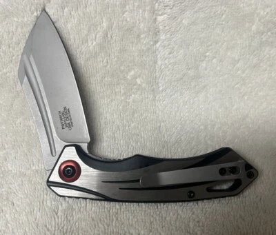 Navaja de bolsillo Wartech con marco plateado con bloqueo y punta de transporte asistida por resorte de metal Foto 1 de 3