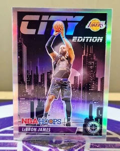 2023-24 PANINI PREMIUM STOCK BALONCESTO EDICIÓN CIUDAD LEBRON JAMES SILVER PRIZM - Imagen 1 de 1