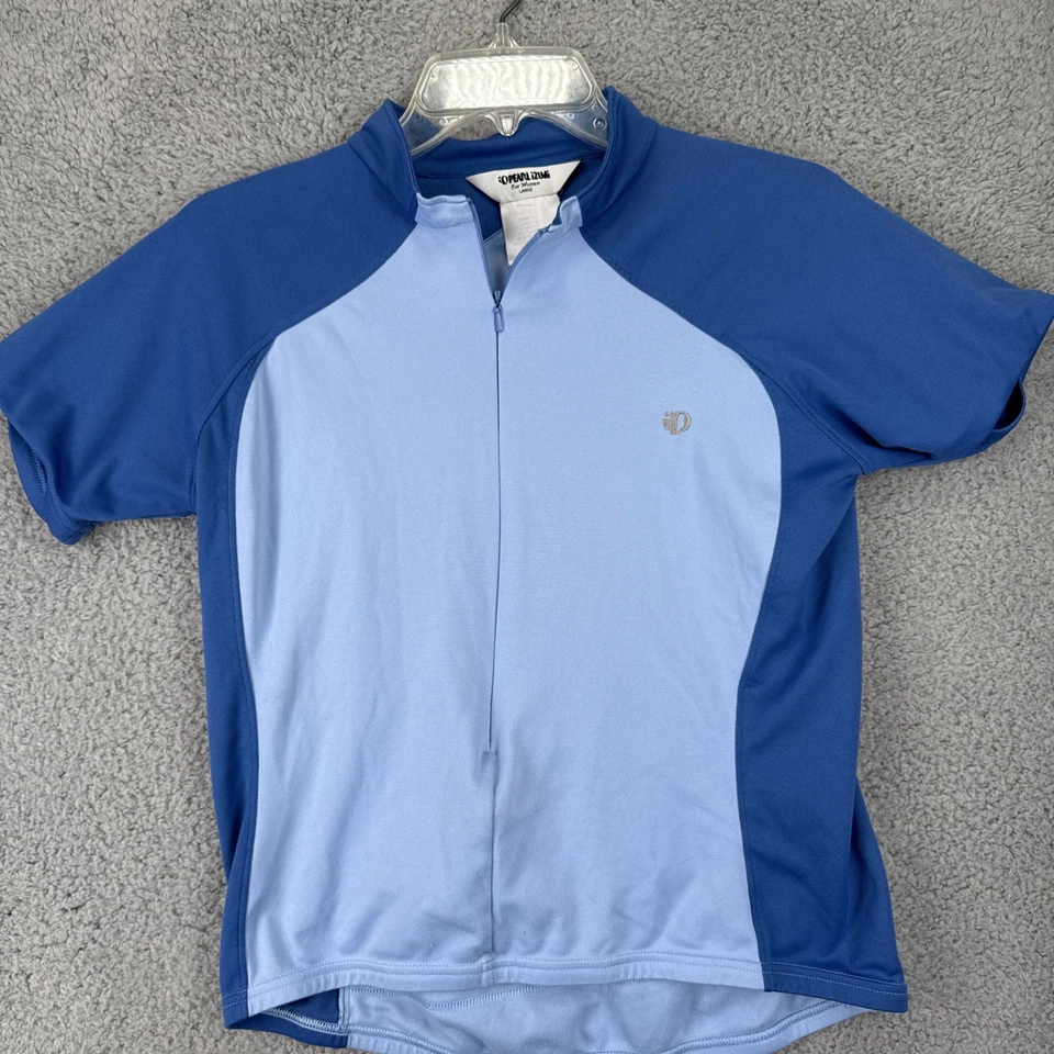 Camisa de ciclismo feminina Pearl Izumi grande S/S bolsos aquáticos 1/4 zíper - Imagem 1 de 4