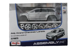 Jeep Grand Cherokee Laredo Maisto model kit Assembly Line 1:24 In scatola - Foto 1 di 8