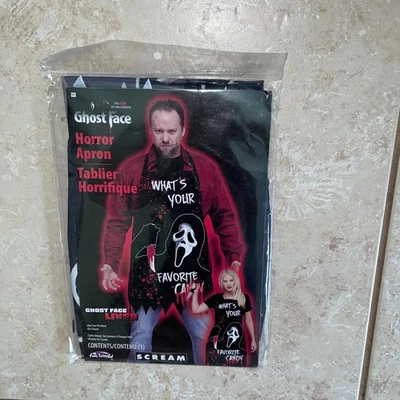 DELANTAL ADULTO GRITO CARA FANTASMA HORROR CASA EMBRUJADA DISFRAZ FW96907 Foto 1 de 3