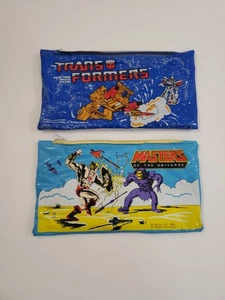 Konvolut 2 Vintage 1983 Master of the Universe He-Man & 1985 Transformers Pouches - Bild 1 von 8