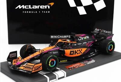 1:18 2022 Daniel Ricciardo -- Singapore GP -- McLaren MCL36 -- Minichamps F1 - Image 1 of 4