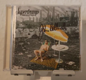 ORIGINAL Autogramm von John Helliwell. pers. gesammelt. Auf CD Cover. SUPERTRAMP - Picture 1 of 1