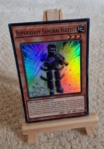 Yu-Gi-Oh - Superschwerer Samurai-Flötist - Super Rare - SECE-DE007 - M/NM - Bild 1 von 2