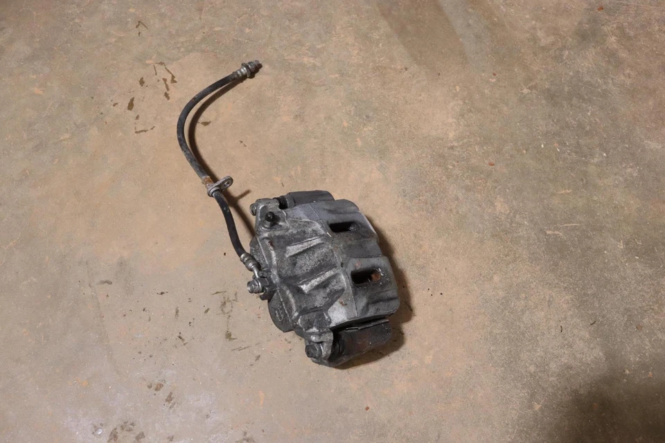 Pinza de freno delantera izquierda Honda Odyssey 2011-2017 con manguera OEM Foto 1 de 4