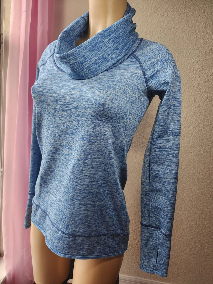 Top deportivo Reebok pequeño azul capucha cuello pulóver manga larga agujeros para el pulgar nuevo sin etiquetas  Foto 1 de 4