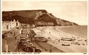Postcard Seaton nr Sidmouth Devon motor cars boats East Beach and Haven Cliff - Picture 1 of 2
