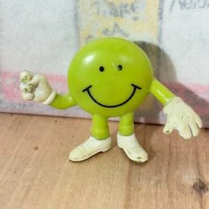Figura Emoji Sonriente Verde Let's Dance, Máquina Expendedora de Juguetes, Goma 1.5" - Imagen 1 de 4