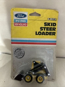 1/64 FORD NEW HOLLAND L555 SKID STEER LOADER box 11 - Picture 1 of 5