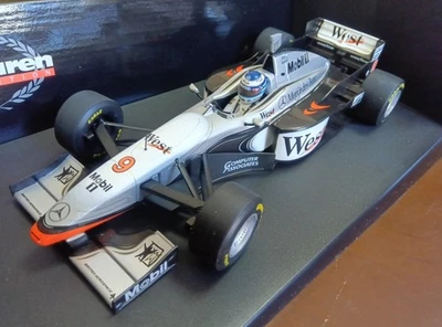 Minichamps 1/18 McLaren Mercedes MP4-12 Hakkinen F1 modello auto tabacco nuovo - Immagine 1 di 3
