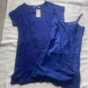 NEU DAMEN WEICH UMGEBUNG 2-TEILIGES LEINEN/BAUMWOLLE KLEID/SLIP GRÖSSE PXS - Bild 1 von 10