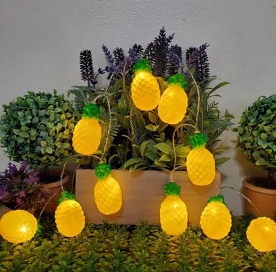 Гирлянды на тему ананаса с 10 светодиодными лампами зеленые и желтые пластиковые - Изображение 1 из 4