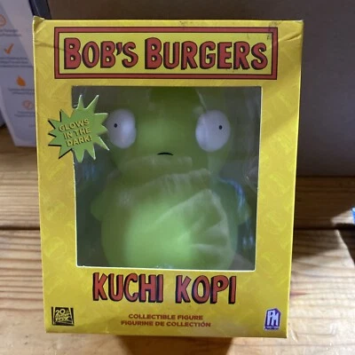 Figura Vinilo Oficial Bob's Burgers Kuchi Kopi Brilla en la Oscuridad 5" Nueva  Foto 1 de 4