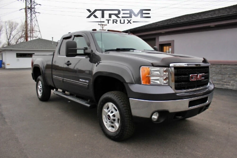 Juego de llamaradas de guardabarros pintables estilo OE para 07-14 GMC Sierra 2500 3500 Foto 1 de 4